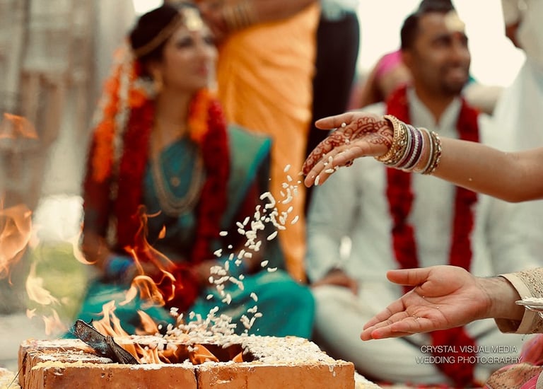 Candid photograph of a wedding ritual in Kerala