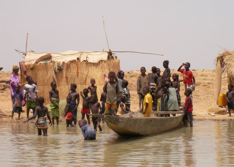 Niger River Village by Sarah Liptrot