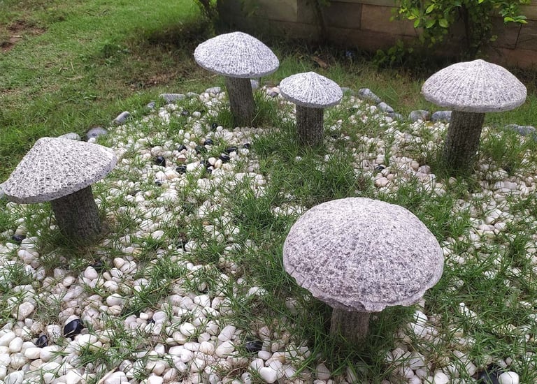 Ornamental boulders and retaining walls in landscape stonework by Garden Designers