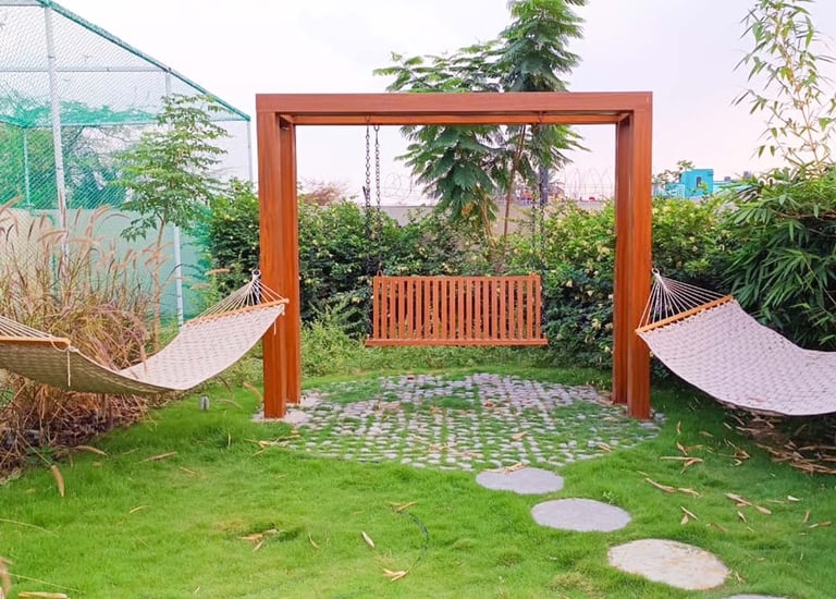 Relaxing resort landscape featuring zen gardens and curated paths by Garden Designers