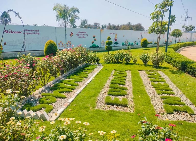 Luxury villa garden with ornamental features and tropical planting by Garden Designers