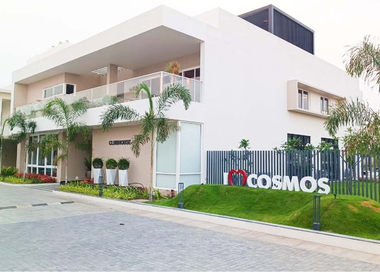 Personalized villa outdoor space with curated greenery and ambient lighting by Garden Designers