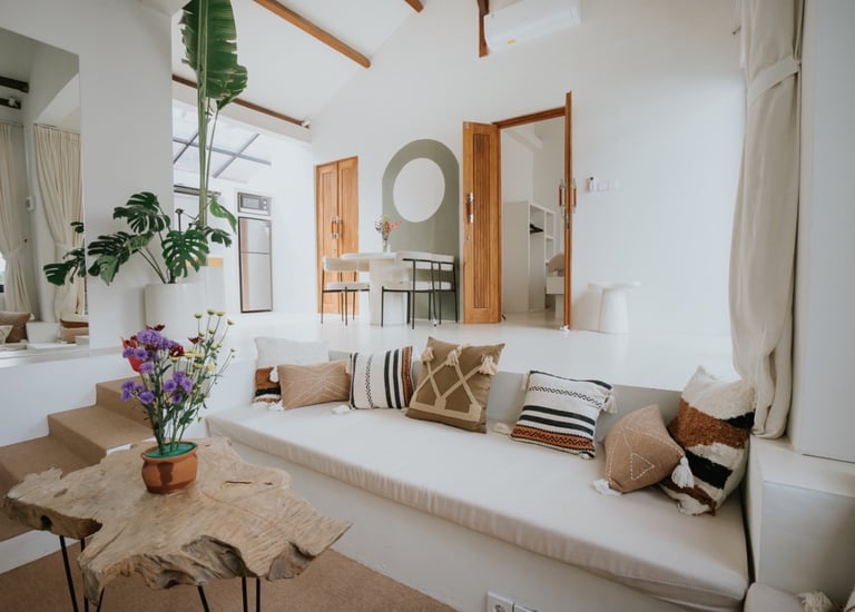 a living room with a couch and a table