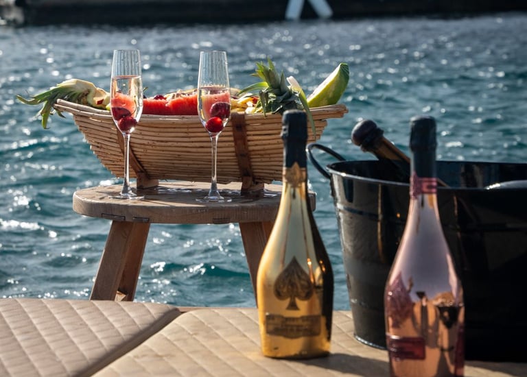 a table with a bottle of wine and a bottle of wine