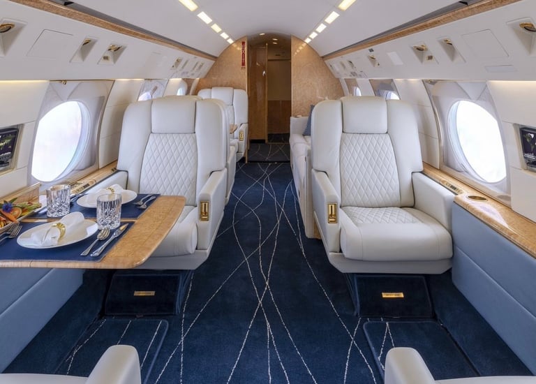 a large airplane with a table and chairs