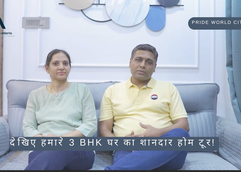 a man and woman sitting on a couch in a living room