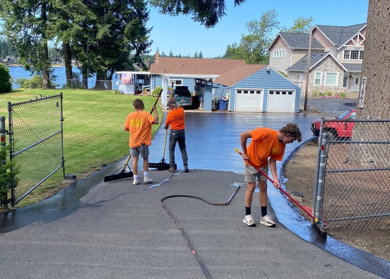 Residential sealcoating driveway in Olympia WA by THE LINE CO.