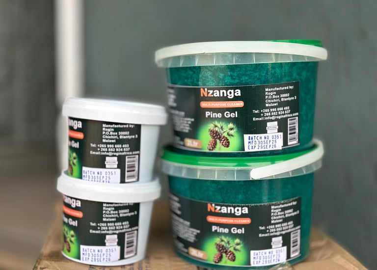 Nzanga Pine Gel multi-purpose cleaner in plastic tubs of various sizes with product labels.