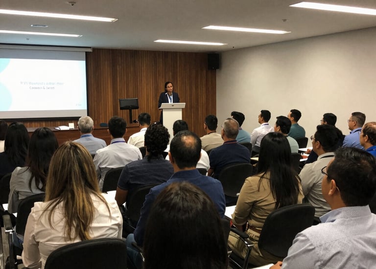 An outdoor music concert with a large crowd and live streaming setup.