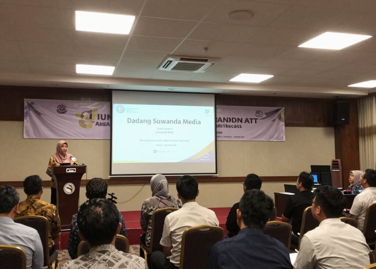 Icon of an auditorium filled with diverse participants