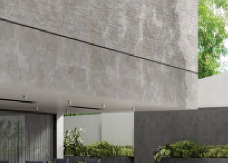 Modern minimalist patio with grey stone effect porcelain tiles on walls and floors.