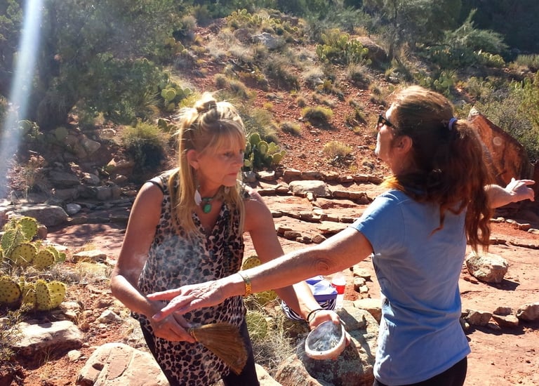 Emily conducts our smudging ceremony at the medicine circle in Sedona's high desert