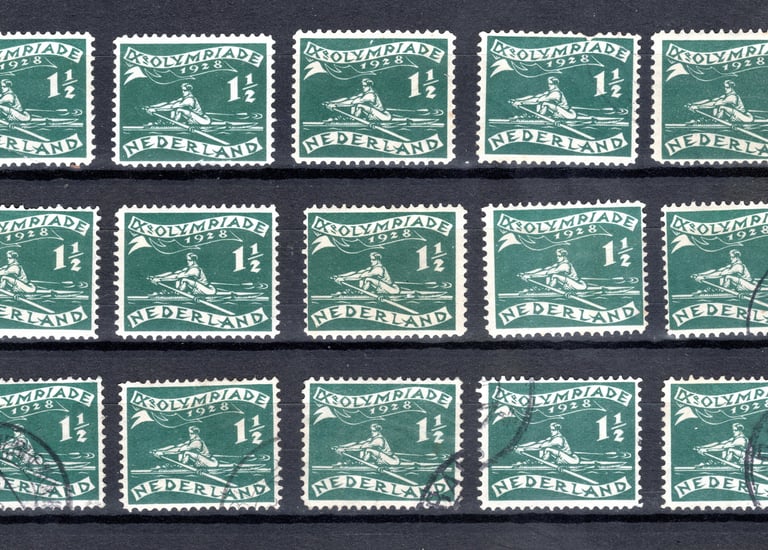 a collection of stamps with a picture of a man on a boat