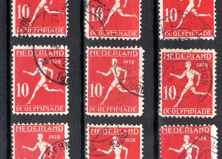a group of stamps with a number of stamps on them