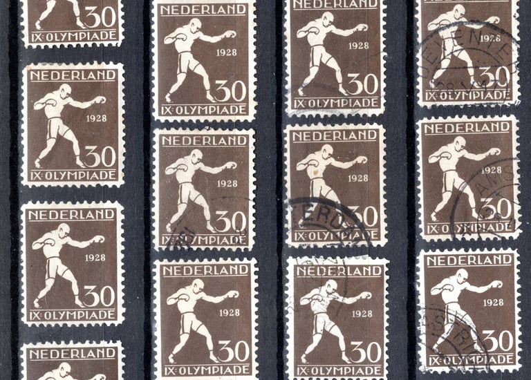 a group of stamps with a picture of a man in a baseball uniform