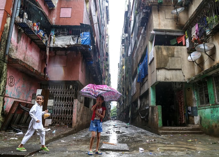 bad urban design of india showing pot filled roads in rainy season and unhygienic stay.