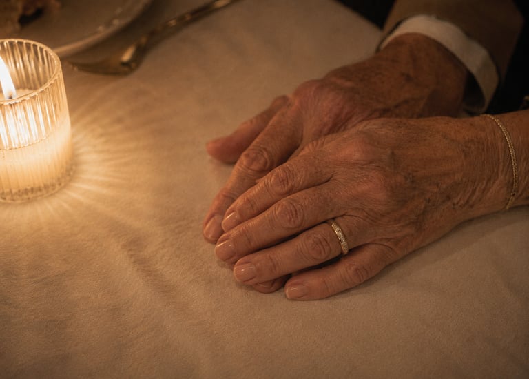 Elderly couple hands with wedding ring candlelight long marriage experience Milestone Creator