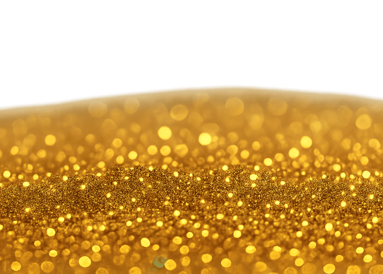 a gold glitter dusted background with a gold glitter dust