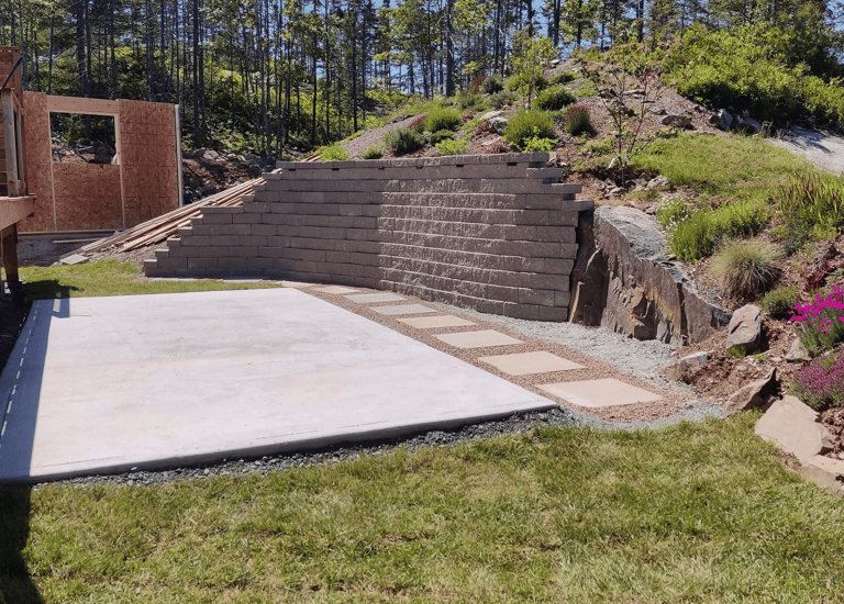 retaining wall and concrete pad