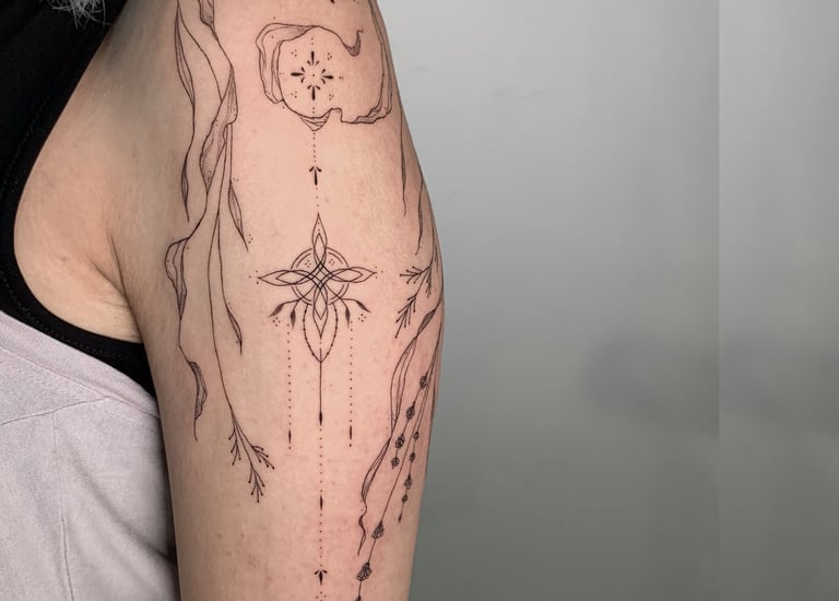 fineline tattoo brazo cusco peru