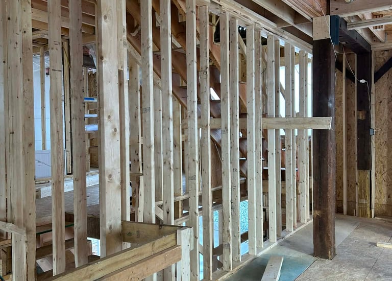 a room with a staircase and a staircase