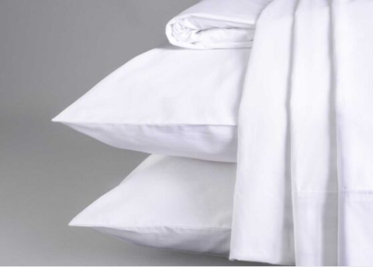 Crisp white 100% organic cotton percale sheet set by Sleep and Beyond