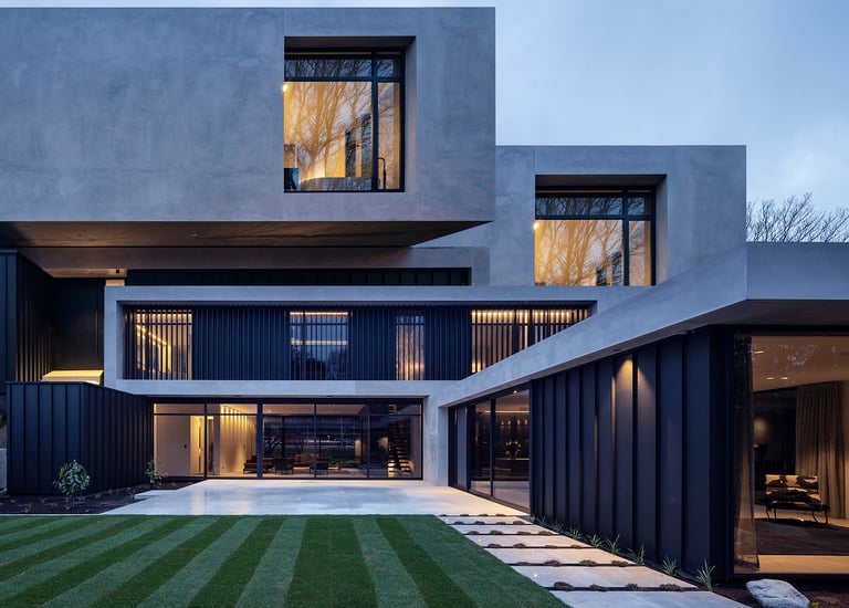 a modern house with a large lawn and a large lawn