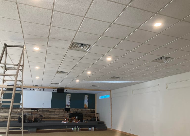 a room with a ladder and ladders in it