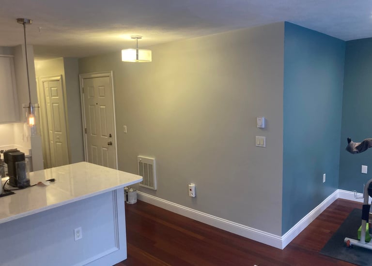 a kitchen with a large counter top and a bike