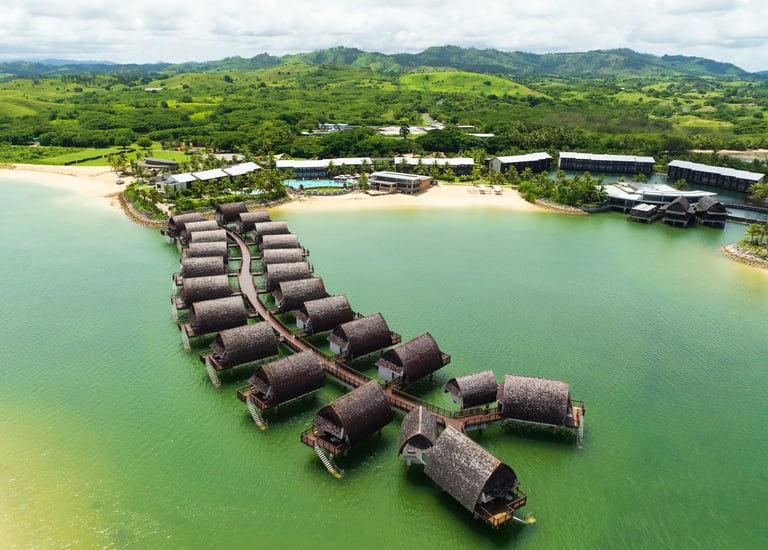 Drone photography of Fiji Marriott Resort Momi Bay, built on a lagoon with direct water access.