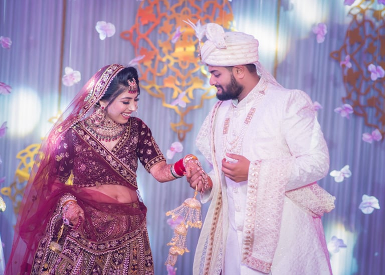 Bride and groom holding hands at their wedding.