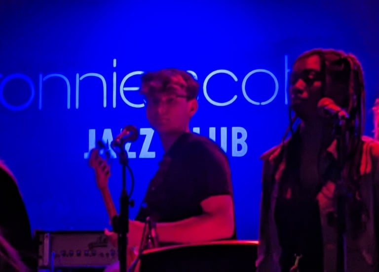 An image of Jamie Walker playing Electric Bass at Ronnie Scott's Jazz Club in London