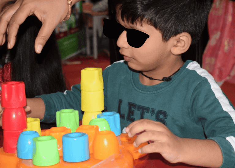 Kid with Learning disorder undergoing ABA Therapy