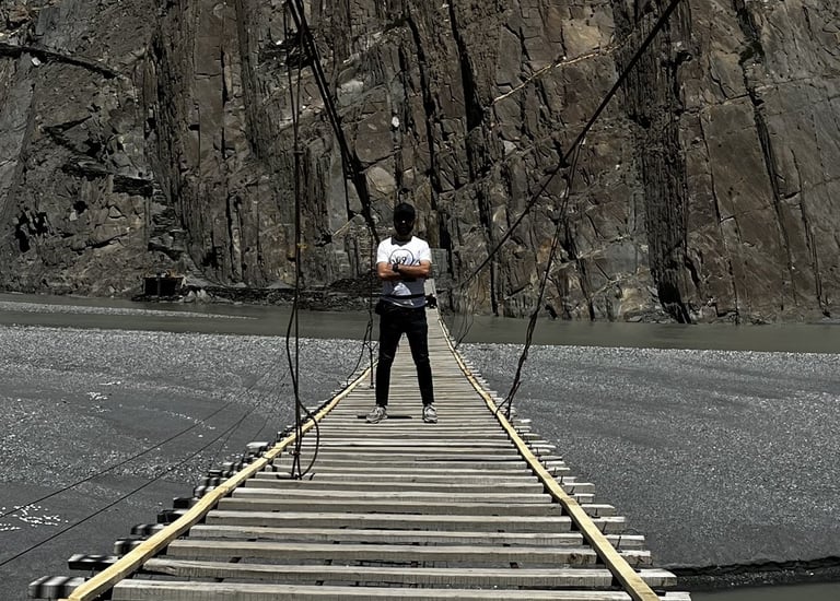 crossing Hussaini suspension bridge