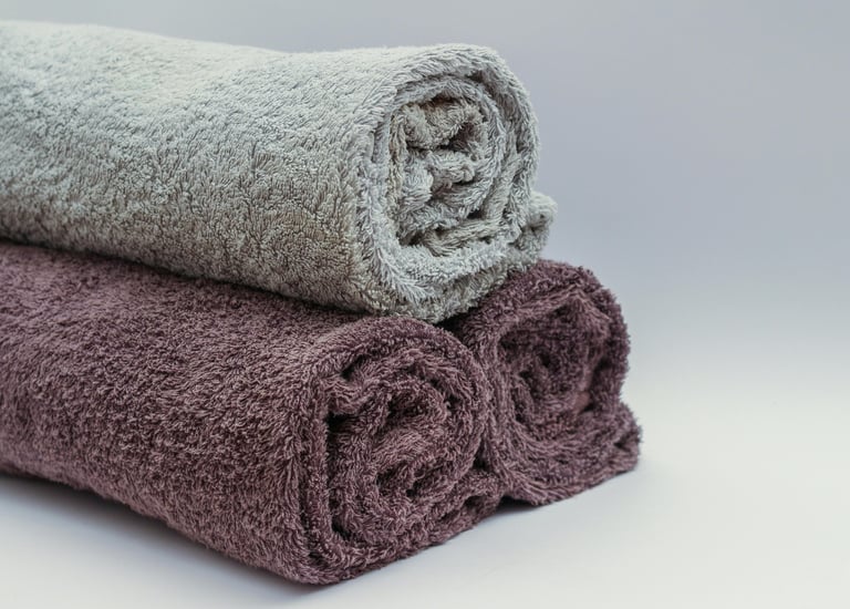 Three different towels rolled together for better display