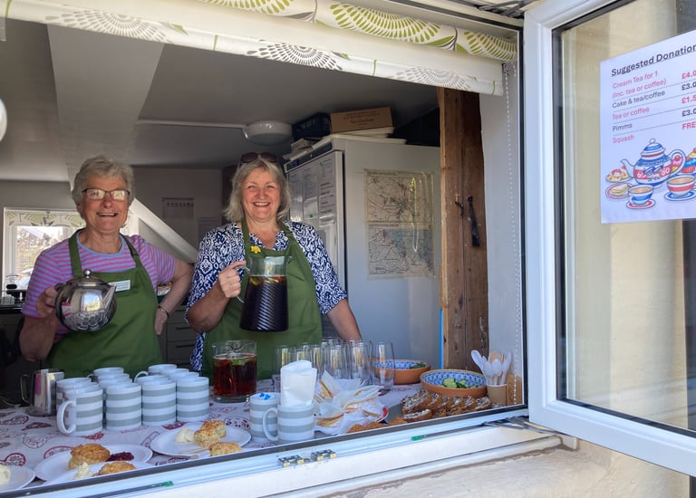 Westbury-sub-Mendip Community Shop volunteers serving tea and coffee
