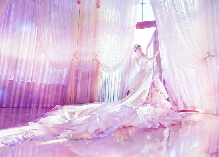 a woman in a wedding dress with a cross on the Koh Samui