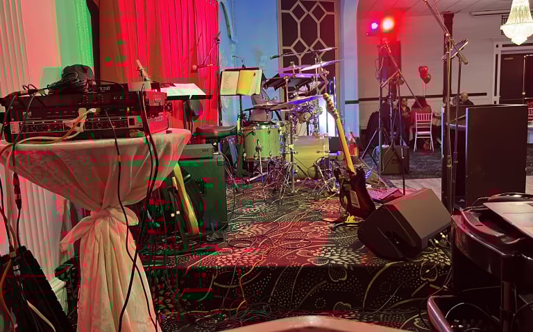 Evolution Band live show with full stage lighting in Toronto