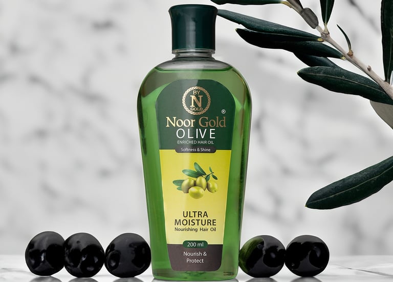 Product photography of green olive oil bottle with olives and marble background