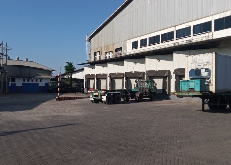 a truck parked in front of a building cold storage