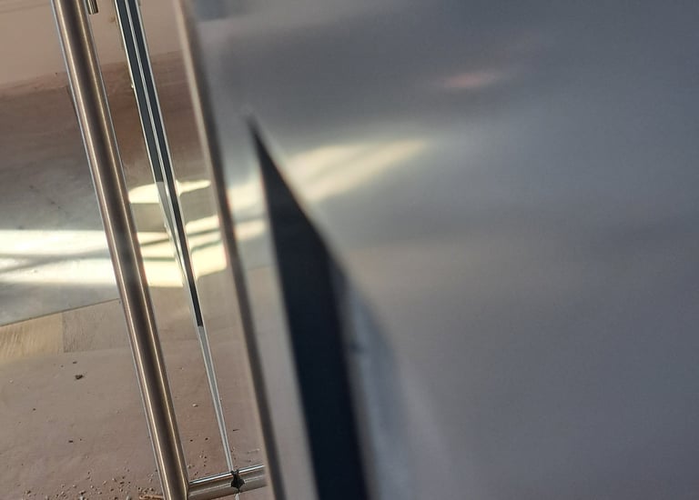shows the precise alignment of an ice machine front door panel and a cabinet door panel