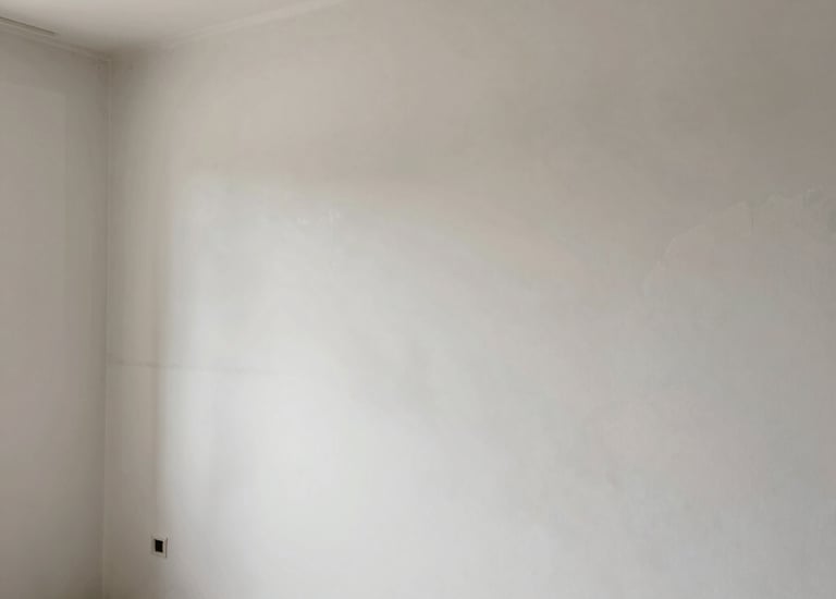 Wide shot of a residential sidewalk replacement project in progress on a sunny day.