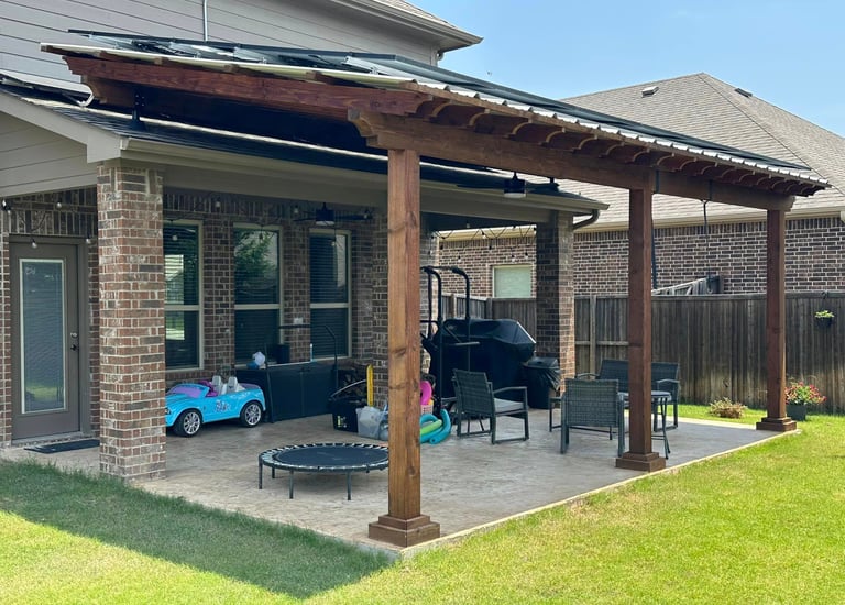 Outdoor Patio with Furniture and Green Grass