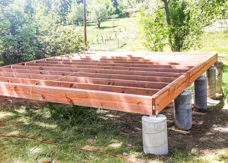 Custom shed floor joists and foundation piers built by Brewer Construction in Denver, Colorado.