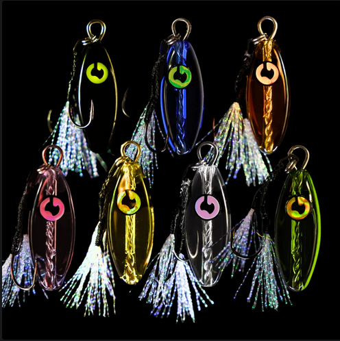 Assorted colorful glass fishing lures designed and made in australia .