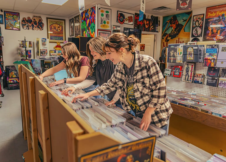 Senior pictures in a record store by Lancaster PA senior picture photographer. Senior Rep Team