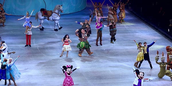 Disney on ice - a group of people in costumes on a stage