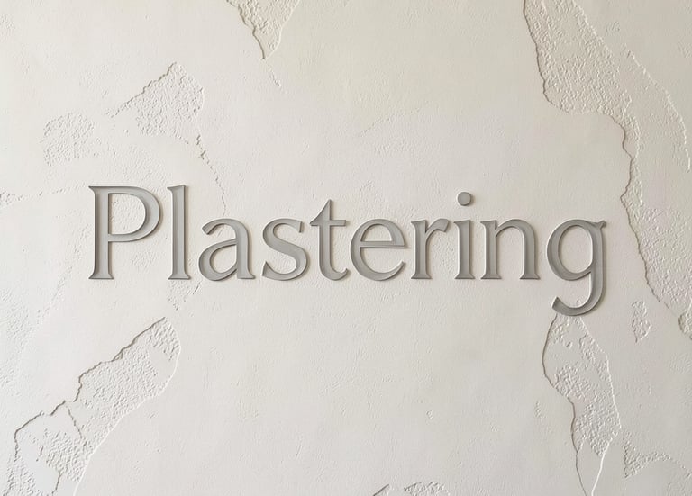 Professional plastering services displayed as gray text on a textured white interior wall.
