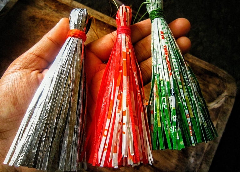 Three mic color of recycle plastic picture on the hand 