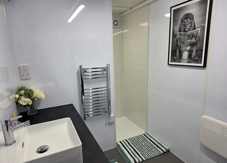 Interior of a fully equipped temporary bathroom pod provided during insurance claims and home renovation projects.